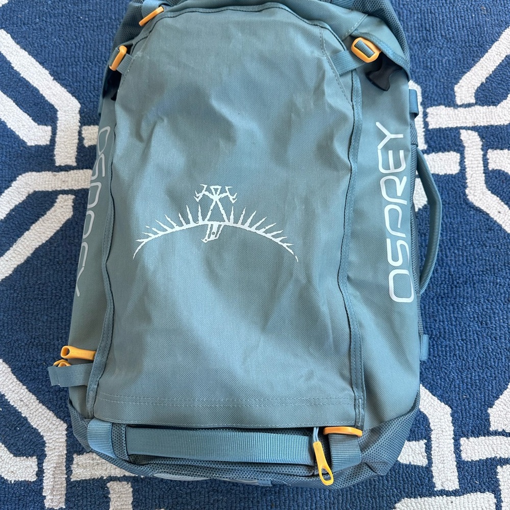 OSPREY Blue and Yellow Backpack Sleek Durable Design